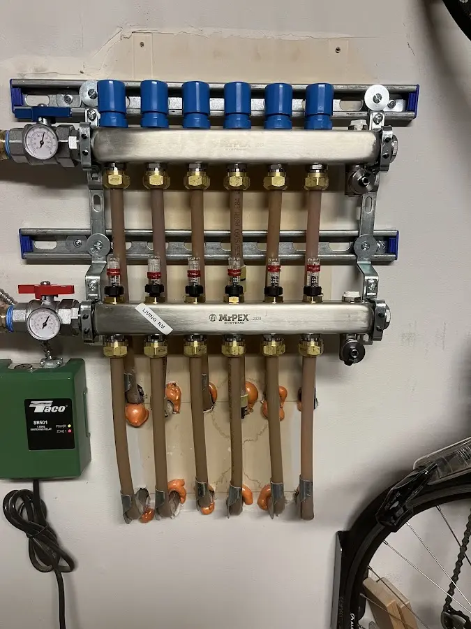 Plumber performing Water Heater Repair at a residential property in Tiptonville